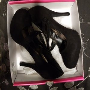 Black suede pumps